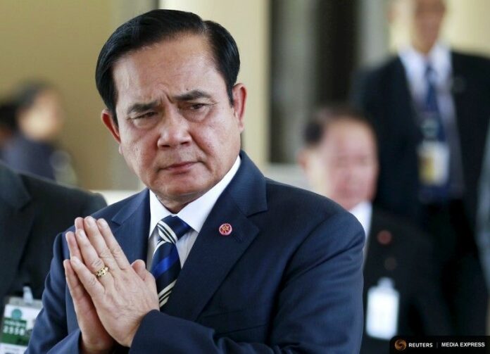 Junta chairman Prayuth Chan-ocha 'wais' on Sept. 9 at Government House in Bangkok. Photo: Reuters / Chaiwat Subprasom