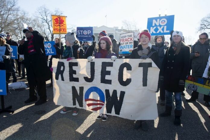 People rally against the Keystone XL pipeline project in Washington earlier this year. Photo: EPA / Michael Reynolds<br />