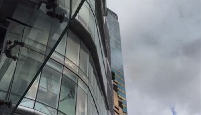 Smoke comes from an upper floor of the Terminal 21 shopping mall today. Photo: @9Tana / Twitter