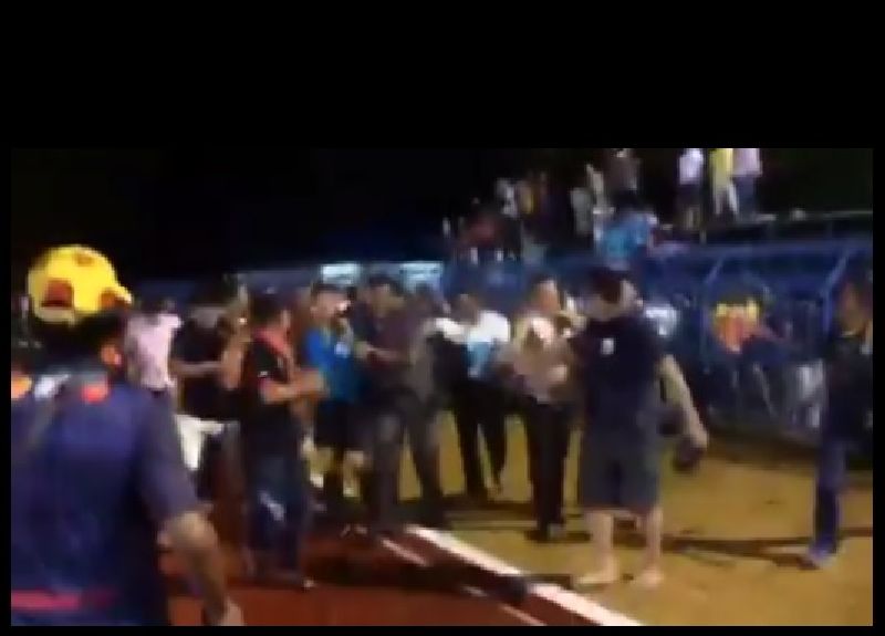 A still image from a video of the altercation that broke out Sunday night at Satun Central Sports Stadium on Sunday.