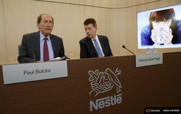 Nestle Chief Executive Paul Bulcke, at left, and Chief Financial Officer Francois-Xavier Roger at an Oct. 16 news conference at the company headquarters in Vevey, Switzerland. Photo: Denis Balibouse / Reuters