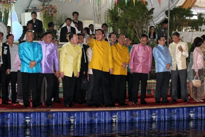 Junta chairman and Prime Minister Prayuth Chan-ocha and other top government officials attend Loy Krathong ceremony yesterday at the canal next to Government House in Bangkok.