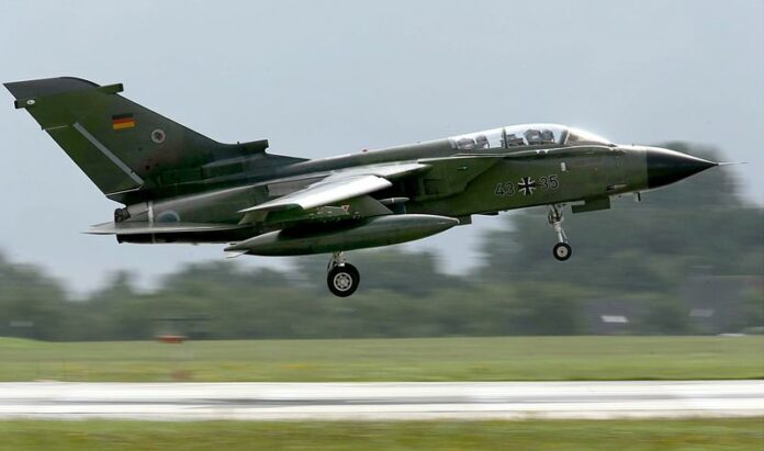 A twin-engine Tornado fighter jet in service to the German Luftwaffe in Jagel, Germany, in a 2006 file photo. Photo: Kay Nietfeld / EPA<br />