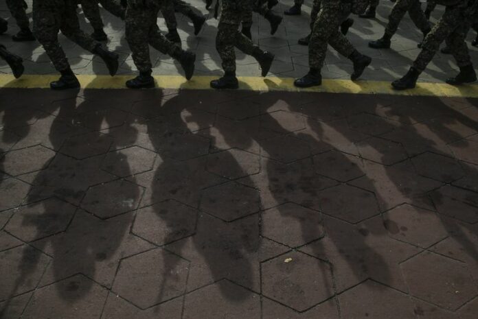 Soldiers march during Malaysia’s Independence Day Parade rehearsal Aug. 27 in Kuala Lumpur, Malaysia. Photo: Fazry Ismail / EPA