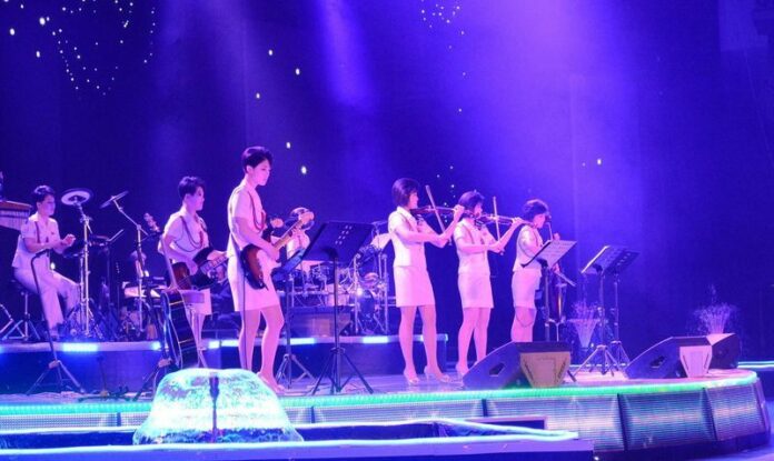 An undated photo released by the North Korean Central News Agency on Dec. 9 shows North Korea's all-female Moranbong Band performing in North Korea. Photo: EPA/KCNA<br />