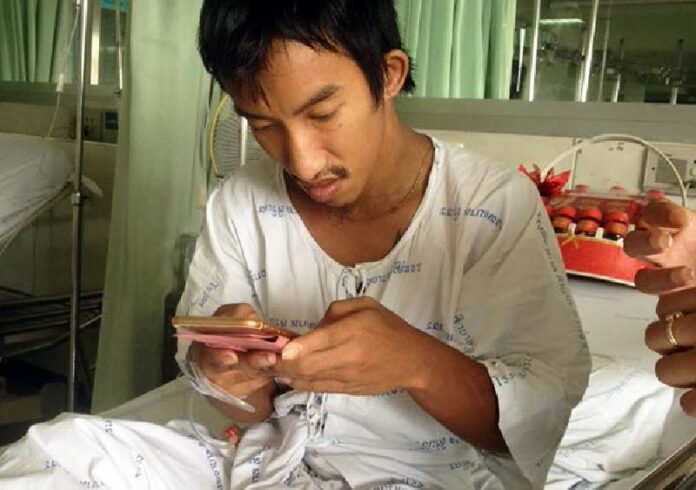 Thanet Anantawong at Sirindhorn Hospital in Bangkok's Prawet district on Sunday before he was removed by by unidentified officers. Photo: Piyarat Chongtthep / Facebook
