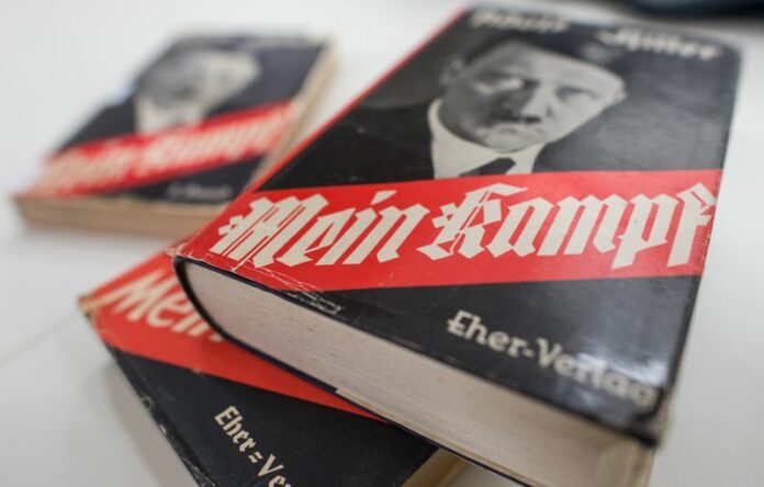 Various editions of Adolf Hitler's Mein Kampf are shown in an undated file photo taken at the Institute for Contemporary History in Munich. Photo: Matthias Balk / DPA<br />