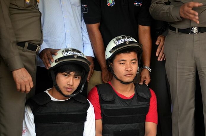 Zaw Lin and Wai Phyo at a police news conference on Tao island, Oct. 3 2014
