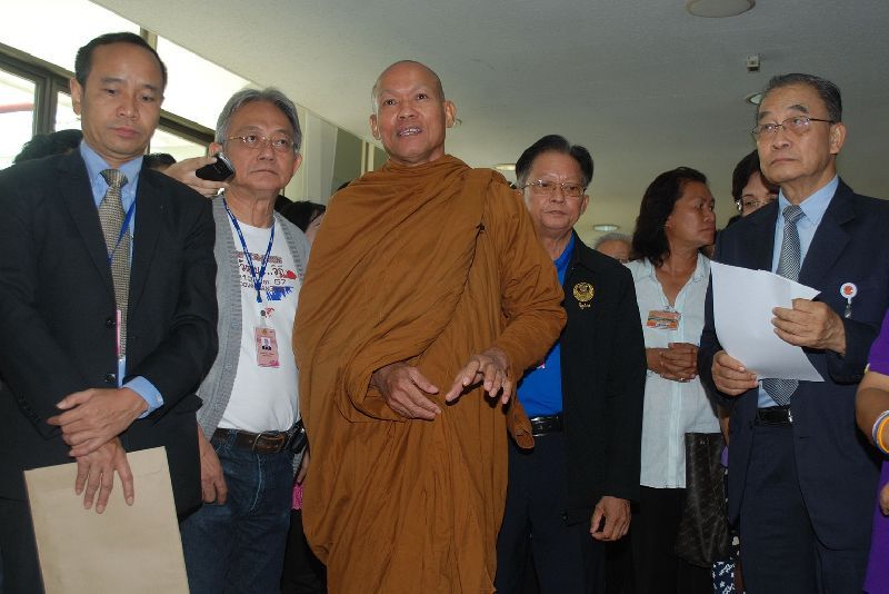 Firebrand monk Buddha Issara, center, in a June 2015 file photo.