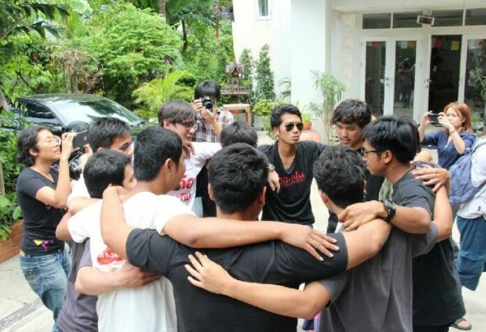 New Democracy Movement activists meet June 25 prior to a pro-democracy march in Bangkok.