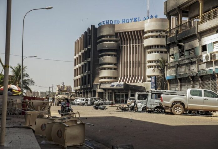 Outside the Splendid Hotel in Burkina Faso's capital city of Ouagadougou where Al-Qaeda militants killed 26 people Saturday. Photo: Wouter Elsen / EPA