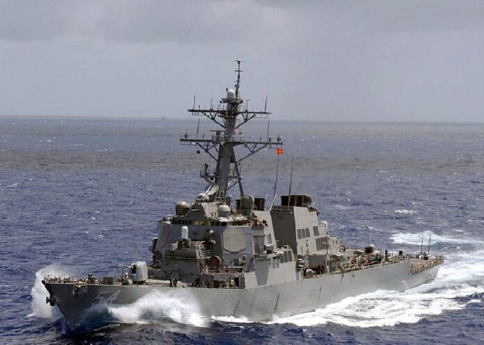 Guided missile destroyer USS Curtis Wilbur sails in the open waters of the western Pacific Ocean in a 2003 file photo. Photo: U.S. Navy