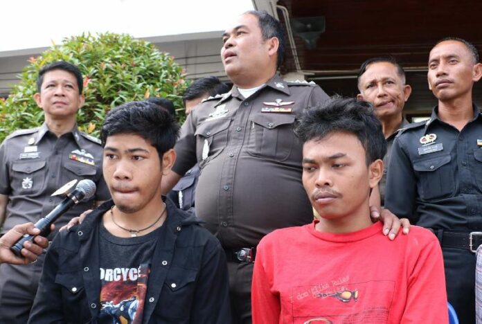 Two of the four suspects at police news conference on Feb. 2 in Phatthalung province.