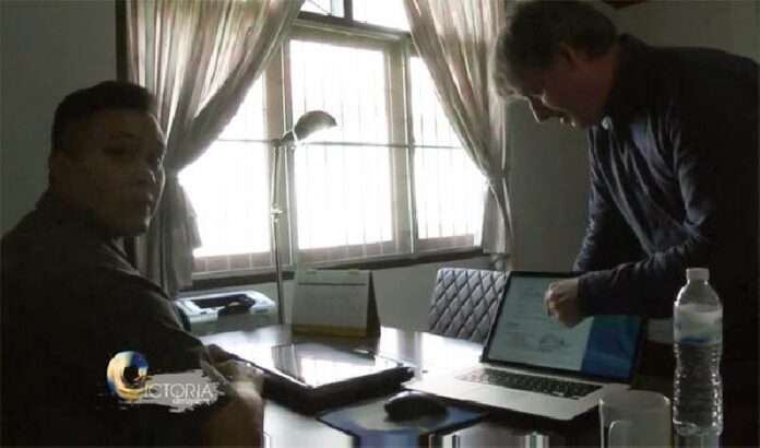 BBC correspondent Johnathan Head, at right, confronts Phuket lawyer Pratuan Thanarak in a scene from a September video report for BBC Two.