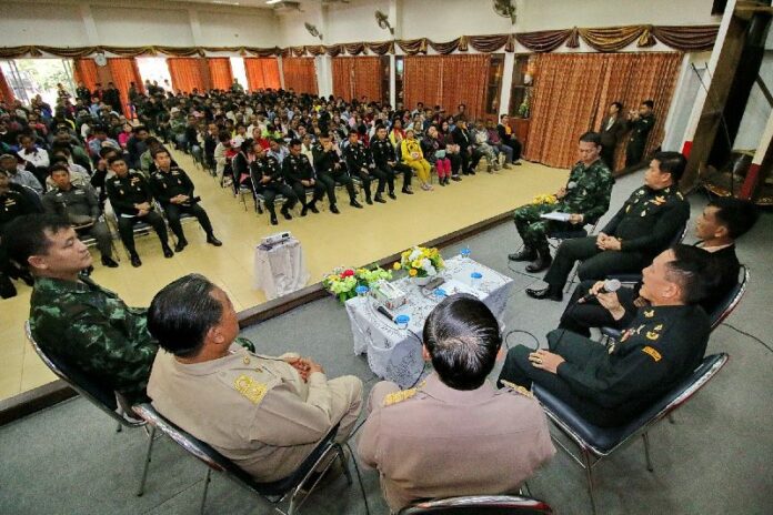 Army officers lecture an audience Monday in Ratchaburi province about the supposed improvements in the new charter draft.