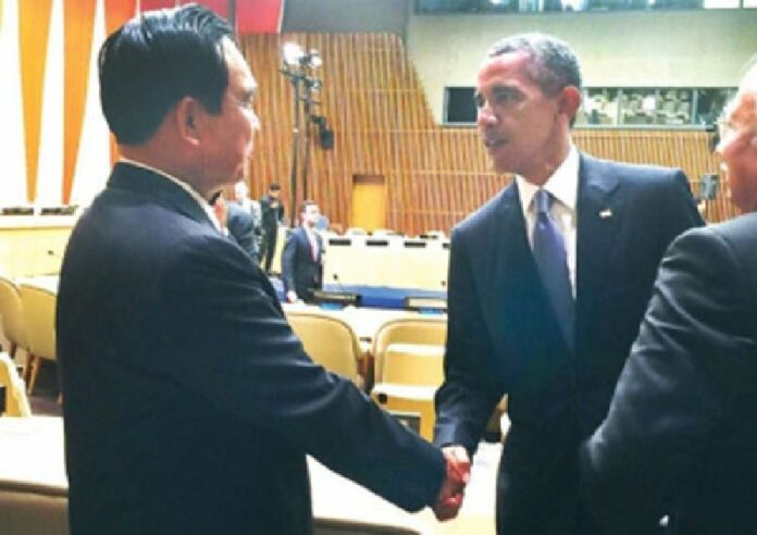 A widely dissected and debated photograph of junta chairman Prayuth Chan-ocha and US President Barack Obama shaking hands Sept. 29 at the United Nations General Assembly in New York.