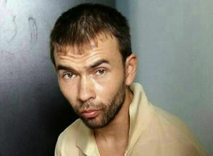 Photo taken by police of Adem Karadag, aka Bilal Mohammed, at the time of his Aug. 29 arrest in Bangkok.