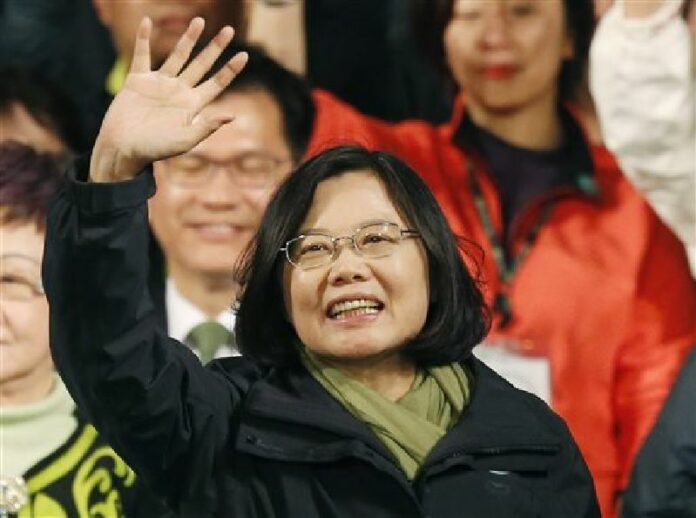 In this Jan. 16, 2016, file photo, Taiwan's president-elect Tsai Ing-wen waves as she declares victory in the presidential election in Taipei, Taiwan. Photo: Wally Santana / Associated Press