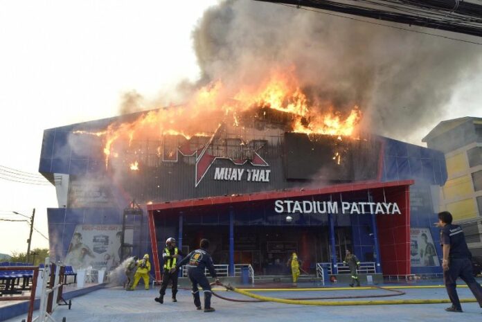 Flames spread through the Max Muay Thai Stadium on Thursday in Pattaya.<br />