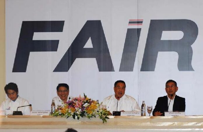 Former police chief Gen. Somyot Pumpanmuang, second from right, gave his first public address Friday as president of the Football Association of Thailand at The Emerald Hotel in Bangkok.