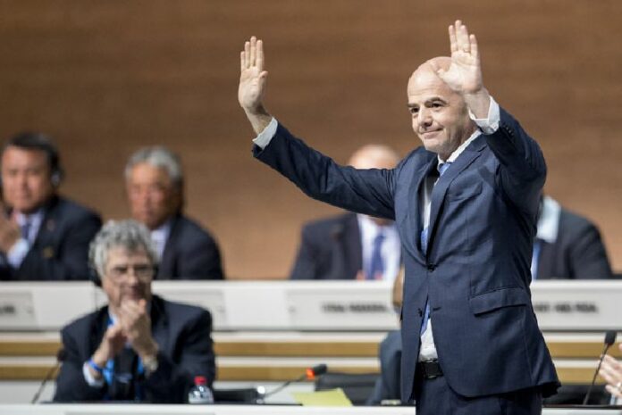 New FIFA president Gianni Infantino of Switzerland, waves to delegates after his election Friday at the Extraordinary FIFA Congress 2016 in Zurich, Switzerland. Photo: Ennio Leanza / Associated Press<br />