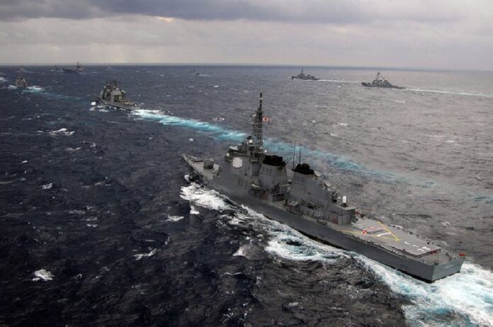 The Japan Maritime Self-Defense Force destroyer JDS Kongou sails in formation with other JMSDF ships and ships in a 2005 exercise. Photo: US Navy<br />