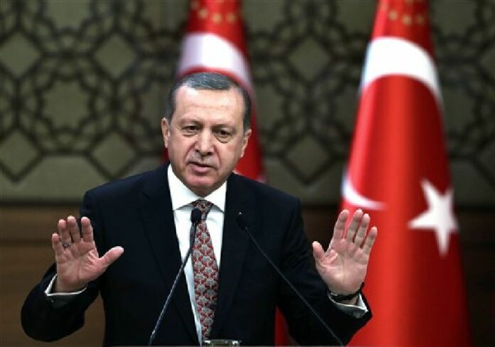 Turkish President Recep Tayyip Erdogan addresses a meeting of local administrators at his palace in Ankara, Turkey, Wednesday, Feb. 10, 2016. Photo: Yasin Bulbul / Associated Press