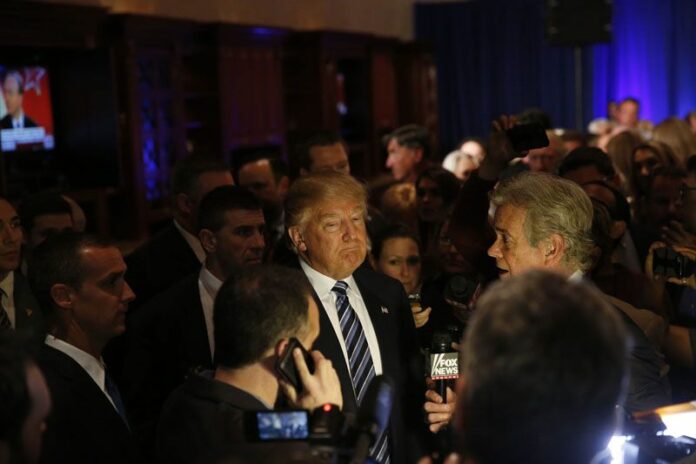 Republican presidential candidate Donald Trump speaks to the media Saturday in Florida. Photo: Brynn Anderson / Associated Press<br />