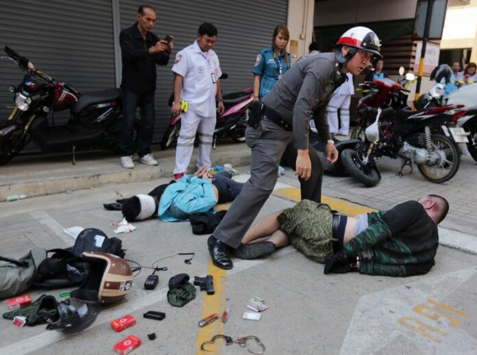 Scene from the attempted robbery at Inter Arms gun store in Bangkok on Friday