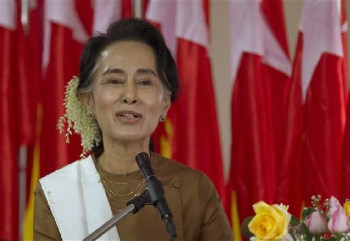 In this Jan. 4, 2016 file photo, NLD party leader Aung San Suu Kyi delivers a speech during a ceremony to mark Myanmar's 68th anniversary of Independence in Yangon, Myanmar. Photo: Gemunu Amarasinghe / Associated Press.