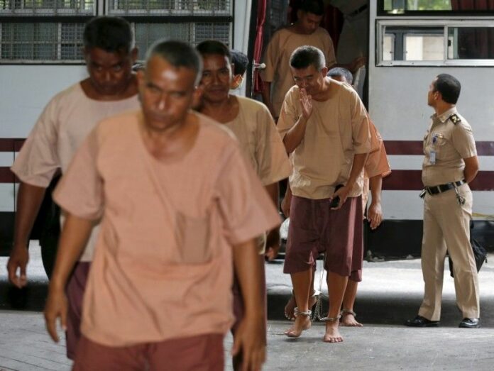 Human trafficking suspects arrive for a hearing at the criminal court in Bangkok, March 15, 2016. Photo: Chaiwat Subprasom / Reuters