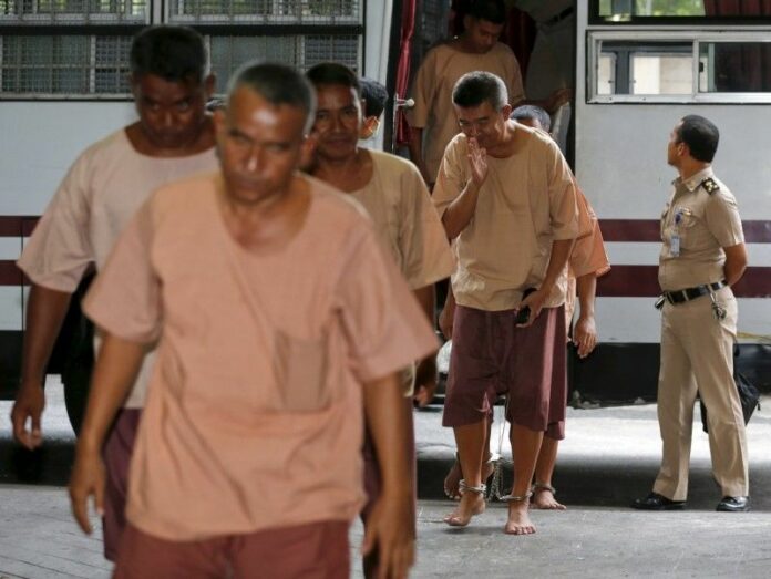 Human trafficking suspects arrive for a hearing at the criminal court in Bangkok, March 15, 2016. Photo: Chaiwat Subprasom / Reuters