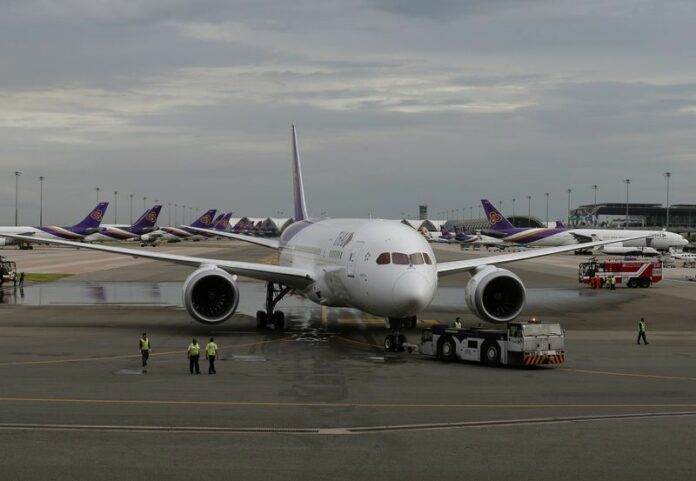 A Thai Airways 787-8 Dreamliner on the runway in July 2014 at Suvarnabhumi Airport. Photo: Narong Sangnak / EPA
