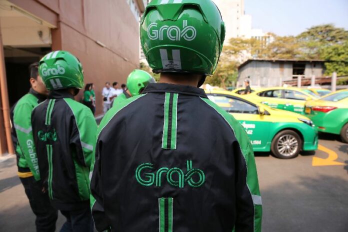 GrabBike taxi operators in a promotional image posted Feb. 3, 2016. Photo: Grab / Facebook