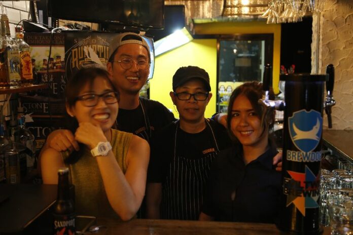Owner Ted Ahn, second from left, and staff at Bangkok’s Changwon Express