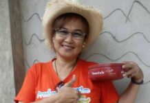 Woman Charged With Sedition For Posing With Red Bucket