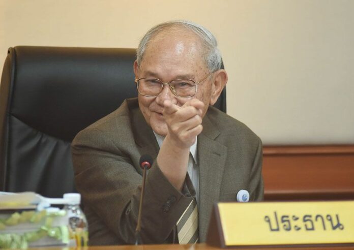 Constitution Drafting Committee Chairman Meechai Ruchuphan presents the final draft of the proposed charter Tuesday in Bangkok.
