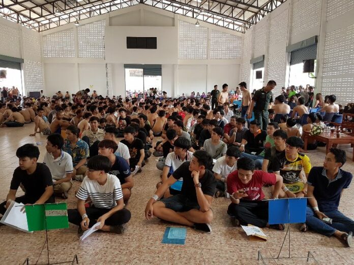 Potential recruits at a drafting station Monday in Nong Khai province.