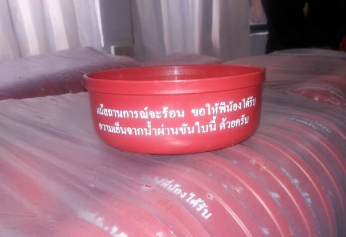 One of thousands of red plastic water scoops to be distributed to Redshirts in the north of Thailand in an undated photo.
