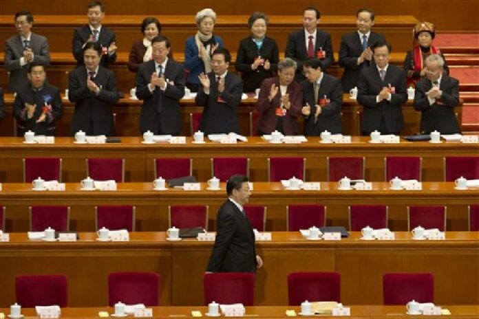 In this March 5, 2016 photo, Chinese President Xi Jinping arrives for the opening session of the annual National People's Congress in Beijing's Great Hall of the People.Photo: Ng Han Guan / Associated Press