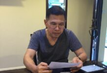 Watana Defiant as He Turns Himself in at Army Base