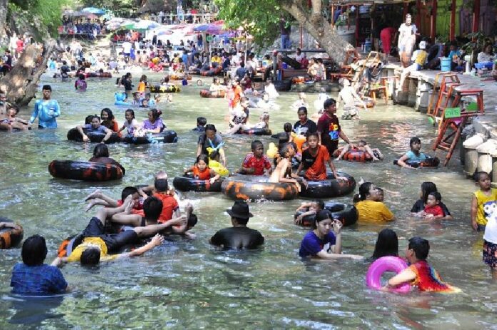 Thousands of tourists per day cool off at Wangnen falls, seen here Monday, in Nakhon Ratchasima.<br />