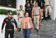 Lese Majeste Filed Against Two Facebookers, Anti-Junta Activist Nuttigar Woratunyawit is escorted to prison April 29, 2017, after bail was denied by a military court in Bangkok.