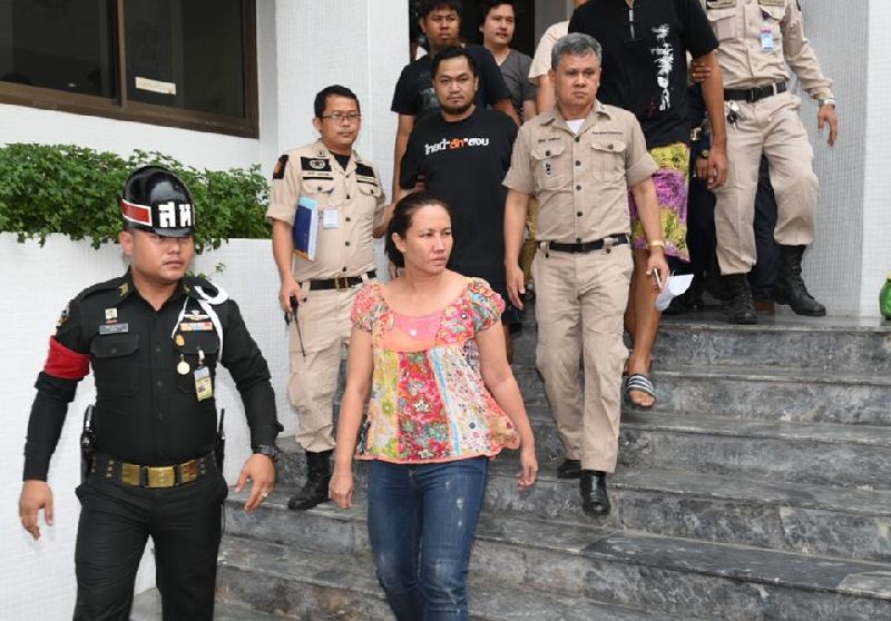 Nuttigar Woratunyawit escorted to prison April 29, 2016, after bail was denied by a military court in Bangkok.