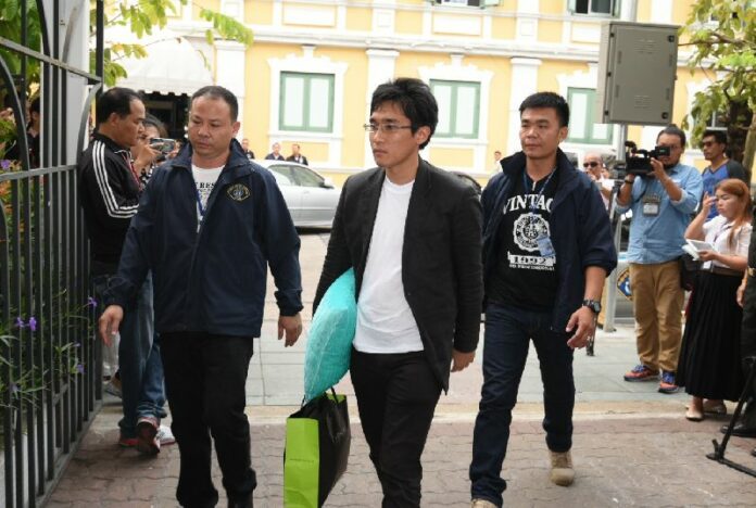 Harit Mahaton is brought to the martial court on Friday morning. He and seven other Facebookers stand accused of sedition and Computer Crime Act.