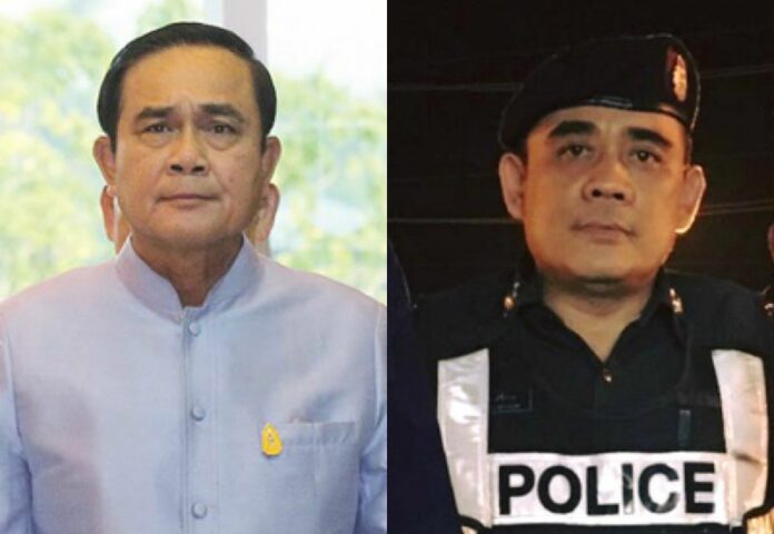 Gen. Prayuth Chan-ocha (left) and Sen.Sgt.Maj. Tharathip Sri-ngam of Mae Rim Police Station<br />