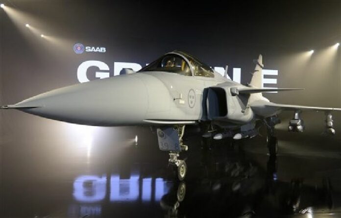 The new E version of the Swedish JAS 39 Gripen multi role fighter being rolled out at SAAB in Linkoping, Sweden, Wednesday, May 18, 2016. Photo: Anders Wiklund / TT / Associated Press