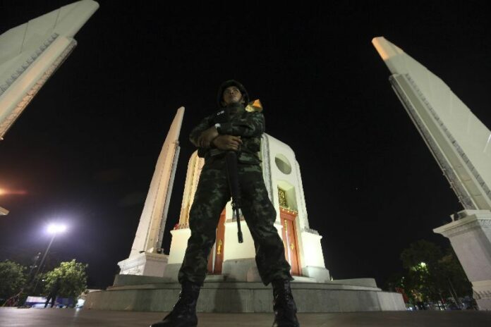 Soldiers posted around the Democracy Monument in 2014 in Bangkok.